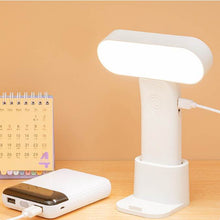 Lade das Bild in den Galerie-Viewer, Luminhold™ Tragbare Lampe mit Handyhalterung
