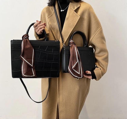 Clu - Elegante und klassische Handtasche