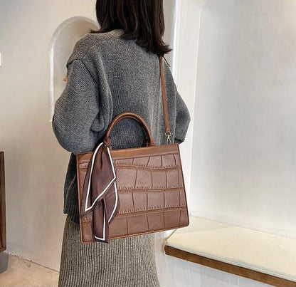 Clu - Elegante und klassische Handtasche