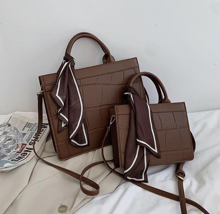 Clu - Elegante und klassische Handtasche