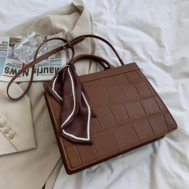 Clu - Elegante und klassische Handtasche