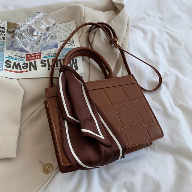 Clu - Elegante und klassische Handtasche