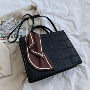 Clu - Elegante und klassische Handtasche