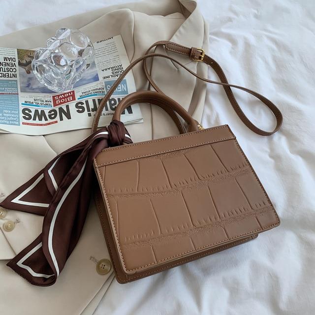 Clu - Elegante und klassische Handtasche